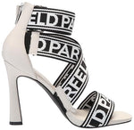 Load image into Gallery viewer, Karl Lagerfeld Paris Women's Careliz Everyday Strappy Sandal Heeled, Soft White, 9
