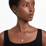 Load image into Gallery viewer, Swarovski Idllyia Necklace and Earring Set, Clear Heart-Shaped Crystal Pendant and Round Crystal Studs in a Rhodium-Finished Setting, Part of The Idyllia Collection
