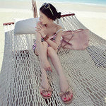 Load image into Gallery viewer, TYFLOVE Women Rivet Flip Flops Studded Jelly Thong Sandals with Bow Summer Bowtie Flat Beach Rain Shoes (Dark-Nude, numeric_9)
