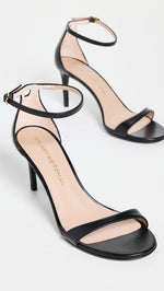 Load image into Gallery viewer, Stuart Weitzman Women's Nudist II Sandal 75, Black, 7 Medium US
