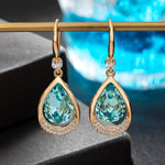Load image into Gallery viewer, Austrian Crystal Halo Teardrop Hollow Drop Dangle Earrings for Women 14K Rose Gold Plated Hypoallergenic Jewelry (Aquamarine)
