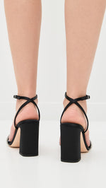 Load image into Gallery viewer, Loeffler Randall Women's Malia Curved Heel Simple Sandals with Ankle Wrap, Black/Diamond, 9.5 Medium US
