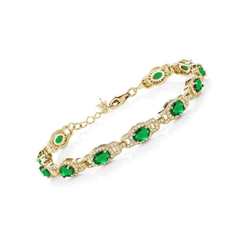 Gem Stone King 18K Yellow Gold Plated Silver Green Simulated Emerald Tennis Bracelet For Women (8.00 Cttw, Oval 6X4MM, 7 Inch With 1 Inch Extender)