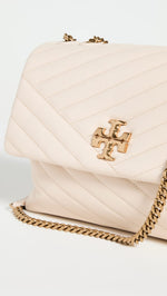 Load image into Gallery viewer, Tory Burch Women's Kira Quilted Chevron Shoulder Bag, New Cream/Rolled Brass, Off White, One Size
