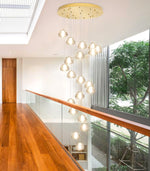 Load image into Gallery viewer, dolria Gold Modern Crystal Chandelier for Staircases 157&quot; Long Adjustable Ceiling Light for Entrance 3000K LED Hanging Lighting Living Room Hallway Entryway
