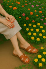 Load image into Gallery viewer, CUSHIONAIRE Voyage Cutout Strap Slides for Women, Slip On Summer Flats, Trendy Footwear, Comfortable Vacation Style Sandals for Women 2025, TAN 7.5
