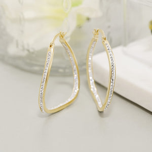 Devin Rose Wavy Oval 40mm Hoop Earrings for Women made with Faceted Crystals in Yellow Gold Plated Brass