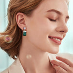 Load image into Gallery viewer, PHNIBIRD Emerald Earrings with Gold Melting Shape Elegant Solitaire Cubic Zirconia Green Earrings for Women Dangle
