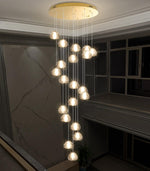 Load image into Gallery viewer, dolria Gold Modern Crystal Chandelier for Staircases 157&quot; Long Adjustable Ceiling Light for Entrance 3000K LED Hanging Lighting Living Room Hallway Entryway
