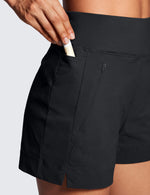 Load image into Gallery viewer, CRZ YOGA Women&#39;s Lightweight Mid Rise Hiking Shorts 4&#39;&#39; - Stretch for Athletic Summer Travel Outdoor Golf with Zip Pockets Black Medium
