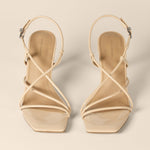 Load image into Gallery viewer, Amazon Essentials Women's Strappy Stiletto Heel Sandals, Beige Patent, 7.5
