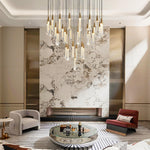 Load image into Gallery viewer, 34-Light Gold Chandeliers for High Ceilings, Large Raindrop Chandelier for Foyer, Entryway, Staircase, Luxury Long Big Hanging Light Fixtures with Glass, Brass Pendant Light Fixtures Living Room

